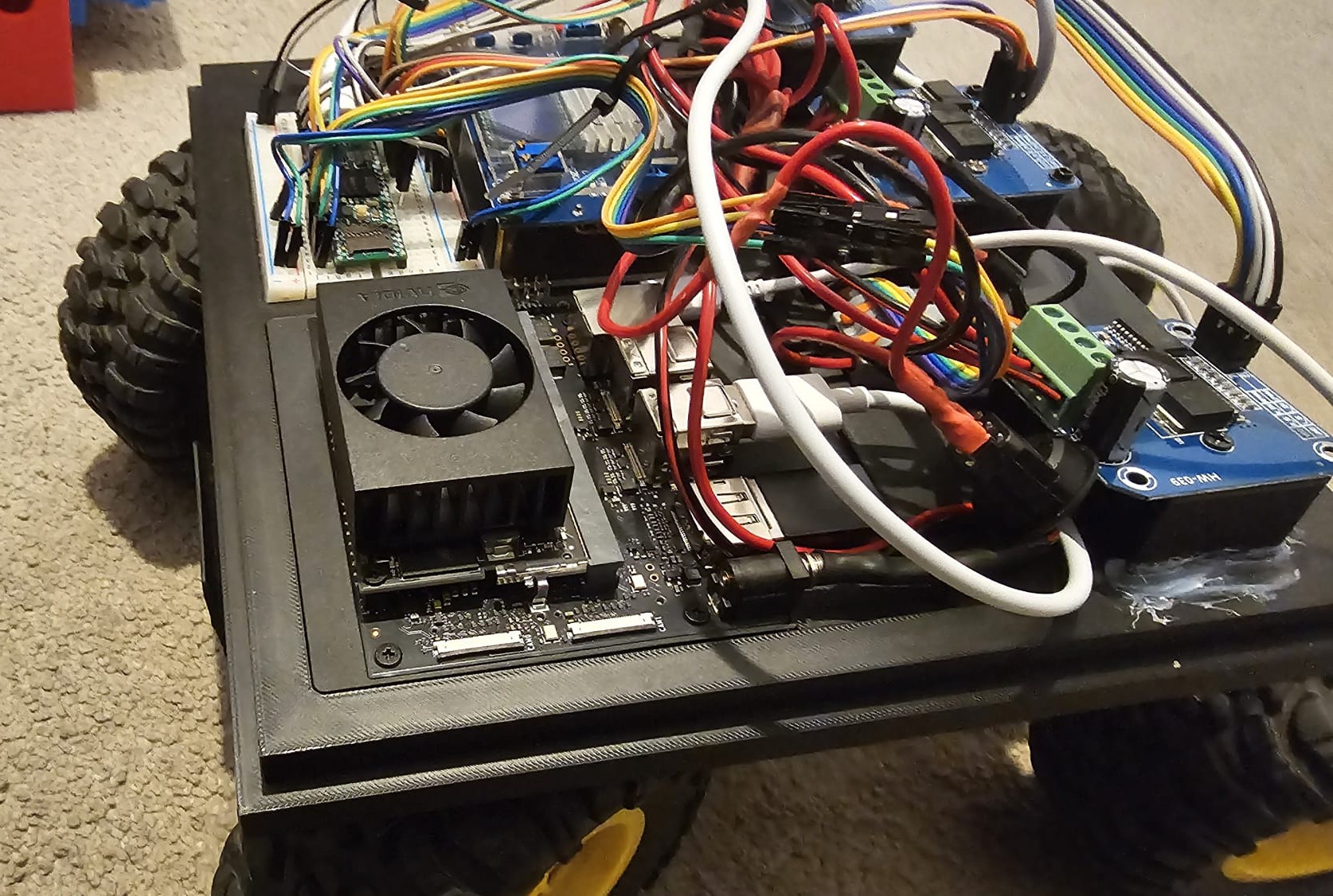Jetson Orin Nano and motor drivers mounted on the robot chassis
