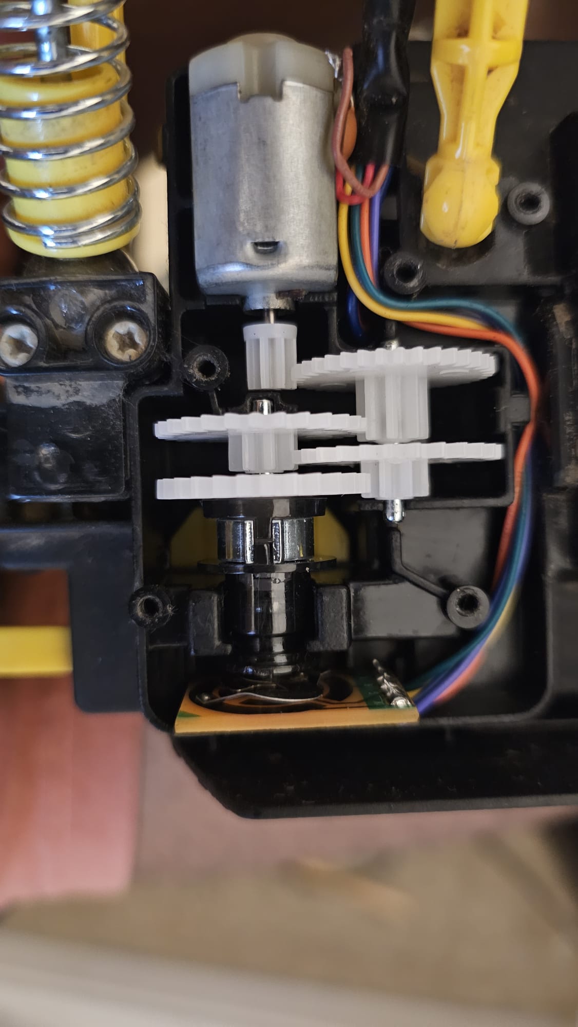 Ackermann steering gear train driven by a DC motor